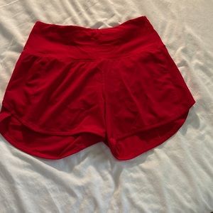 Size 4 dark red speed up high rise lululemon shorts.
